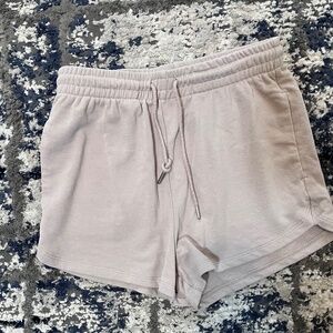H&M taupe colored lounge shorts with pockets and waist tie